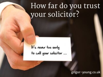 Solicitor's Hand Showing Business Card