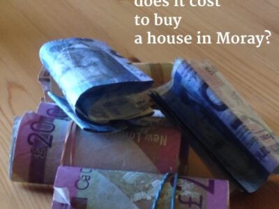 Pile of bank notes on a kitchen table