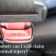 Close-up of the buckle of a seat belt or safety belt vehicle safety device concept of safe driving and transportation by car.